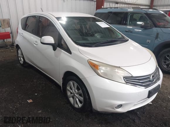 ✅ 2014 Nissan Note S • VIN: 3N1CE2CPXEL351482 • Lot: 42969566. Listed on IAAI with 104,628 mi. Free auction sales archive from the USA and detailed vehicle history report at DreamBid. Image 1.