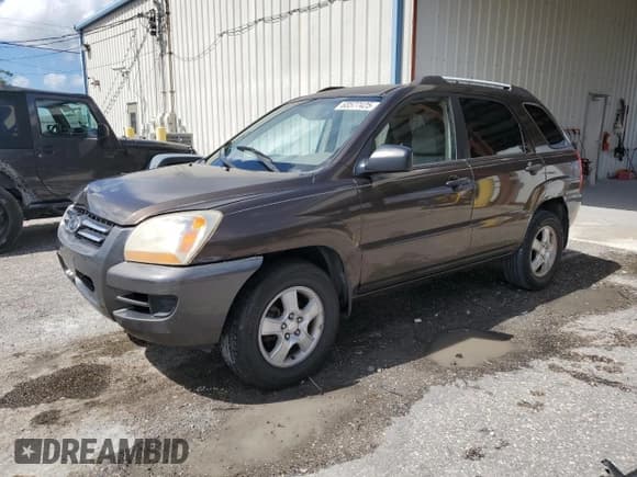 ✅ 2006 Kia Sportage LX • VIN: KNDJF724467264236 • Lot: 68577425. Listed on Copart with 221,120 mi. Free auction sales archive from the USA and detailed vehicle history report at DreamBid. Image 1.