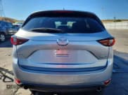✅ 2020 Mazda CX-5 Touring • VIN: JM3KFBCM8L1810080 • Lot: 90259945. Wystawiony na Copart z przebiegiem 57 139 mil. Bezpłatny archiwum sprzedaży aukcyjnych z USA i szczegółowy raport historii pojazdu na DreamBid. Zdjęcie 6.