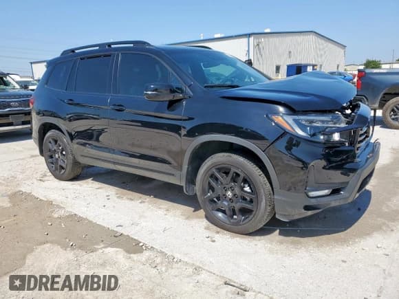 ✅ 2024 Honda Passport Black Edition • VIN: 5FNYF8H86RB002604 • Lot: 58368835. Listed on Copart with 14,145 mi. Free auction sales archive from the USA and detailed vehicle history report at DreamBid. Image 4.