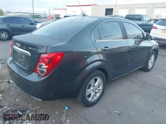 ✅ 2014 Chevrolet Sonic LT • VIN: 1G1JC5SH7E4167993 • Lot: 43055510. Listed on IAAI with 115,256 mi. Free auction sales archive from the USA and detailed vehicle history report at DreamBid. Image 4.