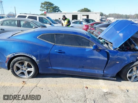 ✅ 2021 Chevrolet Camaro 1LS • VIN: 1G1FB1RX3M0128032 • Lot: 41050713. Listed on IAAI with 58,255 mi. Free auction sales archive from the USA and detailed vehicle history report at DreamBid. Image 13.