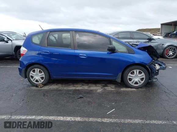 ✅ 2009 Honda Fit • VIN: JHMGE88229C003674 • Lot: 43714999. Listed on IAAI with 229,955 mi. Free auction sales archive from the USA and detailed vehicle history report at DreamBid. Image 13.