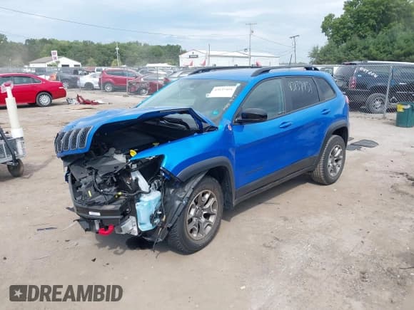 ✅ 2022 Jeep Cherokee Trailhawk • VIN: 1C4PJMBX2ND522285 • Lot: 43137451. Wystawiony na IAAI z przebiegiem 14 205 mil. Bezpłatny archiwum sprzedaży aukcyjnych z USA i szczegółowy raport historii pojazdu na DreamBid. Zdjęcie 2.