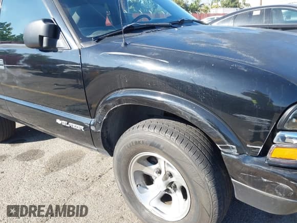 ✅ 2003 Chevrolet Blazer Xtreme • VIN: 1GNCS18XX3K108303 • Lot: 43593593. Wystawiony na IAAI z przebiegiem 135 383 mil. Bezpłatny archiwum sprzedaży aukcyjnych z USA i szczegółowy raport historii pojazdu na DreamBid. Zdjęcie 13.