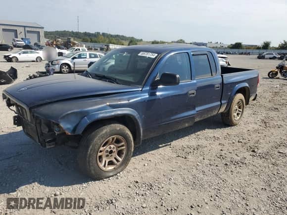 2003 Dodge Dakota Sport с VIN 1D7HL38X33S319159, выставлен на аукционе Copart как лот 69791754 с пробегом 214 326 миль миль и Списание • Salvage title. История ставок и продаж доступна на DreamBid. Изображение 1.