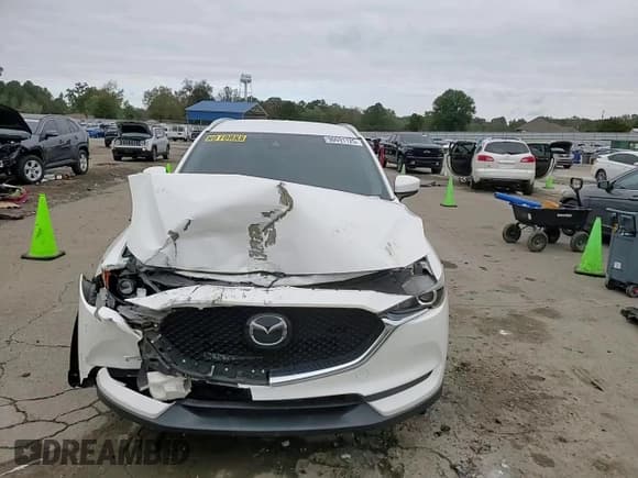 ✅ 2018 Mazda CX-5 Touring • VIN: JM3KFACM0J1429685 • Lot: 90691125. Listed on Copart with 82,393 mi. Free auction sales archive from the USA and detailed vehicle history report at DreamBid. Image 14.