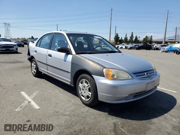 ✅ 2001 Honda Civic DX • VIN: 2HGES16271H551989 • Lot: 82172385. Listed on Copart with 165,732 mi. Free auction sales archive from the USA and detailed vehicle history report at DreamBid. Image 4.