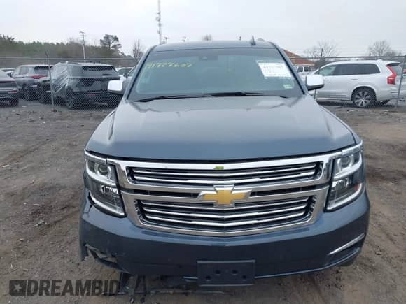 2020 Chevrolet Tahoe Premier z VIN 1GNSKCKJ6LR179033, wystawiony jako IAAI lot #41727607 z przebiegiem 26 879 mil mil oraz . Historia ofert i sprzedaży dostępna na DreamBid. Obrazek 12.