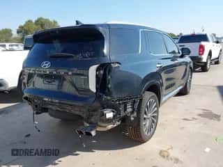 2024 Hyundai Palisade Calligraphy z VIN KM8R7DGE3RU651720, wystawiony jako IAAI lot #43084050 z przebiegiem 27 661 mil mil oraz . Historia ofert i sprzedaży dostępna na DreamBid. Obrazek 4.