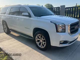 ✅ 2016 GMC Yukon XL SLE • VIN: 1GKS1FKC4GR126775 • Lot: 52828325. Listed on Copart with 110,002 mi. Free auction sales archive from the USA and detailed vehicle history report at DreamBid. Image 1.