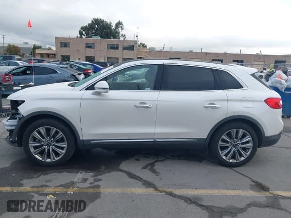 ✅ 2016 Lincoln MKX Reserve • VIN: 2LMTJ8LP3GBL50152 • Lot: 43736310. Listed on IAAI with 91,376 mi. Free auction sales archive from the USA and detailed vehicle history report at DreamBid. Image 15.