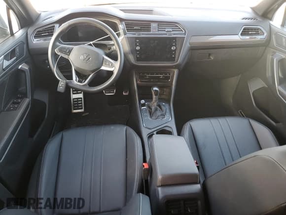 ✅ 2023 Volkswagen Tiguan SE R-Line Black • VIN: 3VVCB7AX4PM054406 • Лот: 85553844. Опубликован ранее на Copart с пробегом Не указан. Бесплатный доступ к архиву аукционных продаж из США и подробный отчёт об истории автомобиля на DreamBid. Изображение 8.