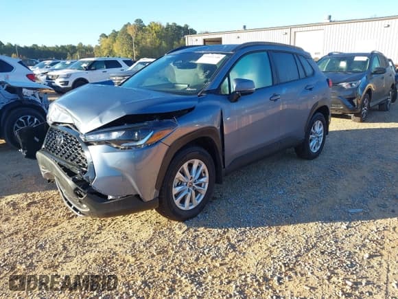 ✅ 2024 Toyota Corolla Cross LE • VIN: 7MUCAAAG1RV110325 • Lot: 43441348. Listed on IAAI with 7,654 mi. Free auction sales archive from the USA and detailed vehicle history report at DreamBid. Image 2.