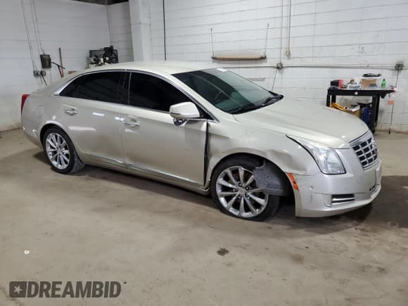 ✅ 2014 Cadillac XTS Luxury • VIN: 2G61M5S34E9151176 • Лот: 71496625. Опубликован ранее на Copart с пробегом 126 857 миль. Бесплатный доступ к архиву аукционных продаж из США и подробный отчёт об истории автомобиля на DreamBid. Изображение 4.