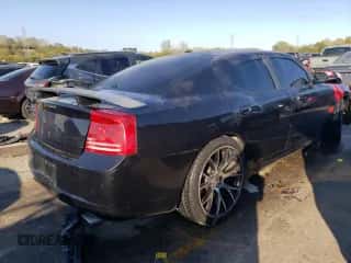 2010 Dodge Charger R/T с VIN 2B3CA8CTXAH257700, выставлен на аукционе Copart как лот 75432704 с пробегом Не указан миль и Списание • Salvage title. История ставок и продаж доступна на DreamBid. Изображение 3.