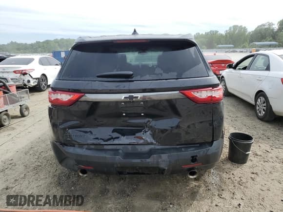 ✅ 2021 Chevrolet Traverse LS • VIN: 1GNEVFKW4MJ199623 • Lot: 58165924. Wystawiony na Copart z przebiegiem 49 999 mil. Bezpłatny archiwum sprzedaży aukcyjnych z USA i szczegółowy raport historii pojazdu na DreamBid. Zdjęcie 6.