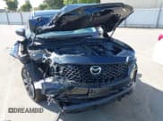 ✅ 2023 Mazda CX-50 Meridian Edition • VIN: 7MMVABXY1PN149136 • Lot: 42587764. Wystawiony na IAAI z przebiegiem 4 748 mil. Bezpłatny archiwum sprzedaży aukcyjnych z USA i szczegółowy raport historii pojazdu na DreamBid. Zdjęcie 19.