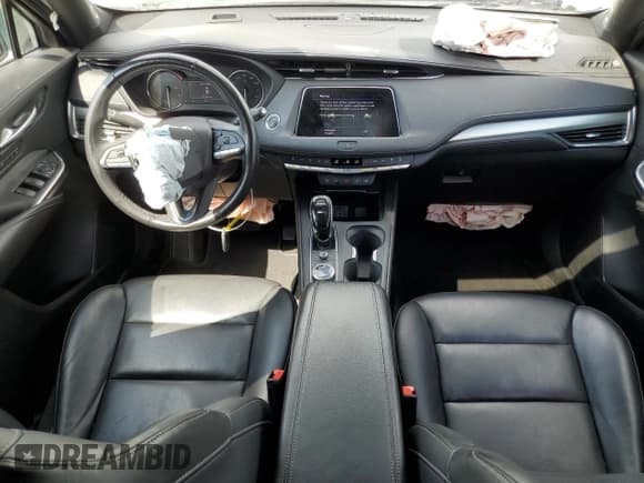 ✅ 2023 Cadillac XT4 FWD Premium Luxury • VIN: 1GYFZCR44PF100465 • Лот: 72099295. Опубликован ранее на Copart с пробегом 29 175 миль. Бесплатный доступ к архиву аукционных продаж из США и подробный отчёт об истории автомобиля на DreamBid. Изображение 8.