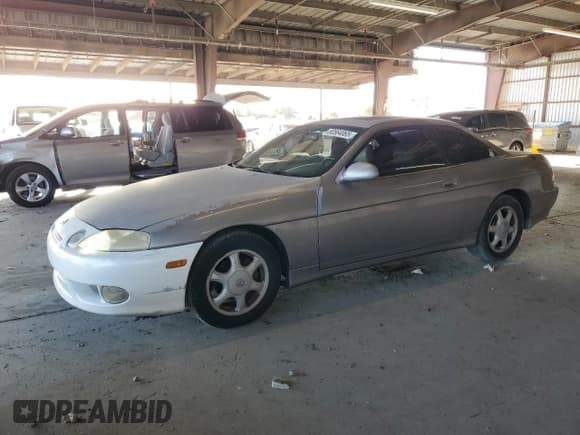 ✅ 1997 Lexus SC 300 • VIN: JT8CD32Z1V0039913 • Lot: 80564065. Wystawiony na Copart z przebiegiem 209 672 mil. Bezpłatny archiwum sprzedaży aukcyjnych z USA i szczegółowy raport historii pojazdu na DreamBid. Zdjęcie 1.