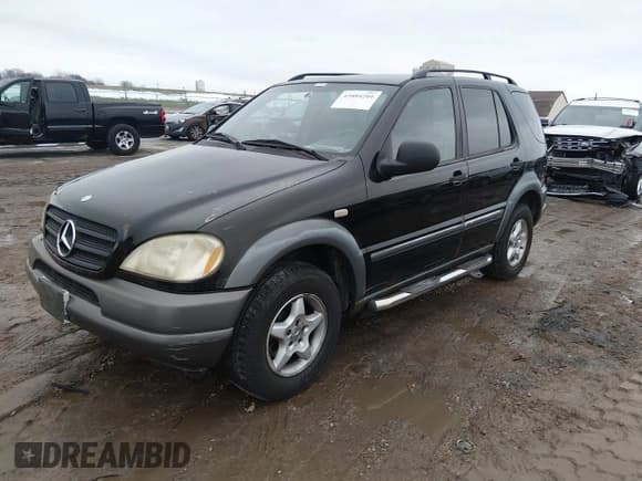 ✅ 1998 Mercedes-Benz M 320/430/500 • VIN: 4JGAB54EXWA012141 • Lot: 43884204. Listed on IAAI with 250,945 mi. Free auction sales archive from the USA and detailed vehicle history report at DreamBid. Image 2.