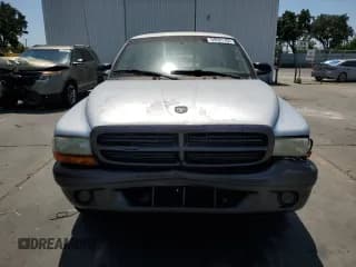 ✅ 2002 Dodge Dakota • VIN: 1B7FL16X62S658103 • Lot: 59591785. Wystawiony na Copart z przebiegiem 157 808 mil. Bezpłatny archiwum sprzedaży aukcyjnych z USA i szczegółowy raport historii pojazdu na DreamBid. Zdjęcie 5.