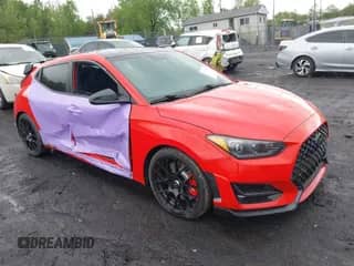 2020 Hyundai Veloster z VIN KMHT36AH1LU004630, wystawiony jako IAAI lot #42159650 z przebiegiem 44 588 mil mil oraz . Historia ofert i sprzedaży dostępna na DreamBid. Obrazek 1.