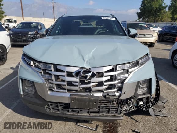 ✅ 2023 Hyundai Santa Cruz SEL • VIN: 5NTJB4AE2PH061557 • Lot: 82627805. Wystawiony na Copart z przebiegiem 38 721 mil. Bezpłatny archiwum sprzedaży aukcyjnych z USA i szczegółowy raport historii pojazdu na DreamBid. Zdjęcie 5.