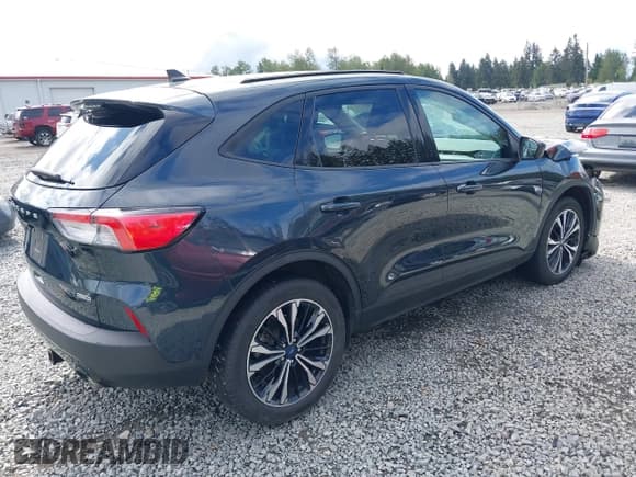 ✅ 2022 Ford Escape SE Hybrid • VIN: 1FMCU9BZ5NUA06681 • Lot: 42302156. Listed on IAAI with 61,582 mi. Free auction sales archive from the USA and detailed vehicle history report at DreamBid. Image 4.