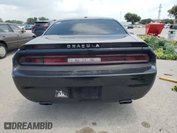 2012 Dodge Challenger SXT z VIN 2C3CDYAG7CH269659, wystawiony jako Copart lot #66377564 z przebiegiem 124 426 mil mil oraz Czysty tytuł • Clean title. Historia ofert i sprzedaży dostępna na DreamBid. Obrazek 6.