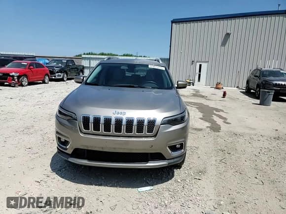 ✅ 2019 Jeep Cherokee Limited • VIN: 1C4PJMDNXKD116701 • Lot: 61015115. Listed on Copart with 31,572 mi. Free auction sales archive from the USA and detailed vehicle history report at DreamBid. Image 14.