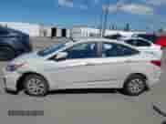 2015 Hyundai Accent GLS z VIN KMHCT4AE4FU936500, wystawiony jako IAAI lot #43347520 z przebiegiem 143 412 mil mil oraz . Historia ofert i sprzedaży dostępna na DreamBid. Obrazek 14.