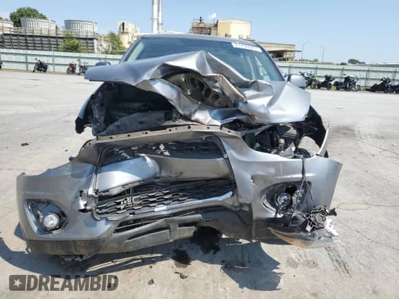 2015 Mitsubishi Outlander ES with VIN 4A4AP3AU2FE022752, listed as a Copart auction lot 71730925 with 212,695 mi miles and Salvage title. Bid and sale history available at DreamBid. Image 5.