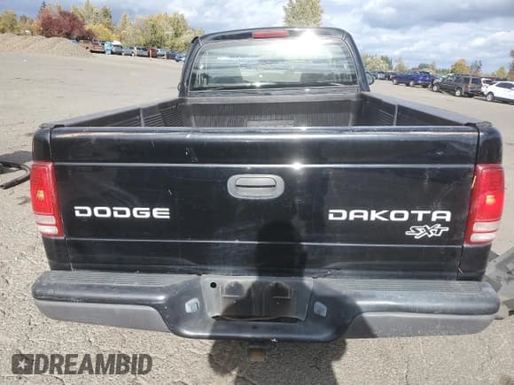 ✅ 2003 Dodge Dakota • VIN: 1D7FL16X43S168315 • Lot: 82673795. Wystawiony na Copart z przebiegiem 162 052 mil. Bezpłatny archiwum sprzedaży aukcyjnych z USA i szczegółowy raport historii pojazdu na DreamBid. Zdjęcie 6.