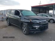 ✅ 2018 Honda Pilot EX-L • VIN: 5FNYF5H56JB016415 • Lot: 42047097. Listed on IAAI with 76,894 mi. Free auction sales archive from the USA and detailed vehicle history report at DreamBid. Image 1.