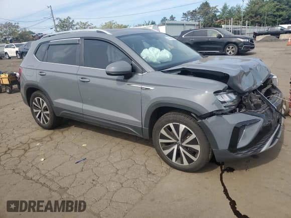 ✅ 2022 Volkswagen Taos SE • VIN: 3VVPX7B20NM040649 • Лот: 84438465. Опубликован ранее на Copart с пробегом 57 948 миль. Бесплатный доступ к архиву аукционных продаж из США и подробный отчёт об истории автомобиля на DreamBid. Изображение 4.