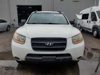 ✅ 2009 Hyundai Santa Fe GLS • VIN: 5NMSG13D69H300311 • Lot: 79285574. Listed on Copart with 412,959 mi. Free auction sales archive from the USA and detailed vehicle history report at DreamBid. Image 5.