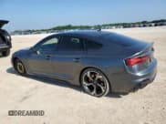 ✅ 2022 Audi RS 5 Sportback • VIN: WUAAWCF51NA900739 • Lot: 55451595. Listed on Copart with 88,652 mi. Free auction sales archive from the USA and detailed vehicle history report at DreamBid. Image 2.