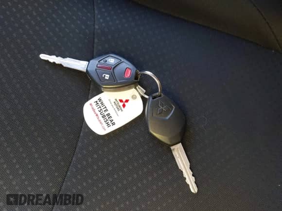 2014 Mitsubishi Outlander ES z VIN 4A4AR3AU0EE022662, wystawiony jako IAAI lot #43609130 z przebiegiem 150 486 mil mil oraz . Historia ofert i sprzedaży dostępna na DreamBid. Obrazek 11.