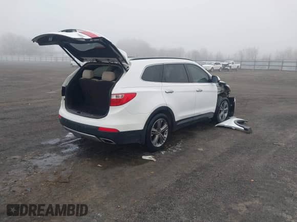 2015 Hyundai Santa Fe Limited with VIN KM8SR4HF7FU091943, listed as a IAAI auction lot 41391336 with 155,217 mi miles and . Bid and sale history available at DreamBid. Image 4.