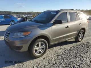 2012 Hyundai Santa Fe GLS z VIN 5XYZG3AB0CG122036, wystawiony jako Copart lot #76293294 z przebiegiem 182 407 mil mil oraz Czysty tytuł • Clean title. Historia ofert i sprzedaży dostępna na DreamBid. Obrazek 1.