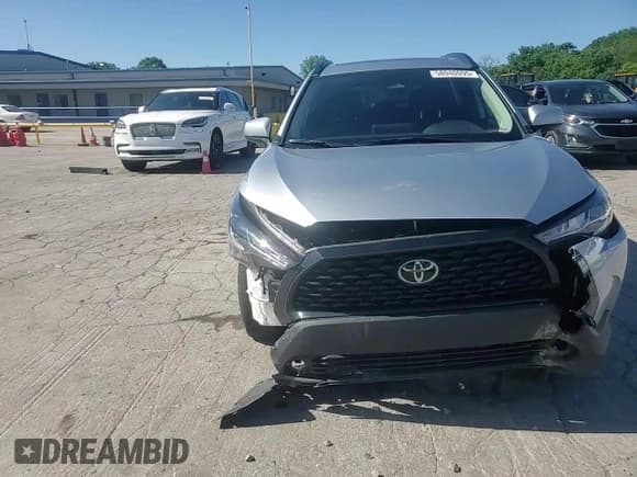 ✅ 2024 Toyota Corolla Cross LE • VIN: 7MUBAAAG0RV103913 • Lot: 58040095. Listed on Copart with 49,059 mi. Free auction sales archive from the USA and detailed vehicle history report at DreamBid. Image 14.