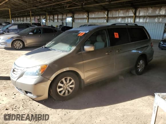 ✅ 2009 Honda Odyssey EX • VIN: 5FNRL38459B413053 • Лот: 82488595. Опубликован ранее на Copart с пробегом 192 917 миль. Бесплатный доступ к архиву аукционных продаж из США и подробный отчёт об истории автомобиля на DreamBid. Изображение 1.