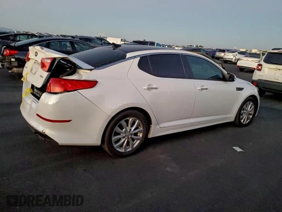 ✅ 2015 Kia Optima EX • VIN: 5XXGN4A75FG413283 • Лот: 93980025. Опубликован ранее на Copart с пробегом 149 912 миль. Бесплатный доступ к архиву аукционных продаж из США и подробный отчёт об истории автомобиля на DreamBid. Изображение 3.