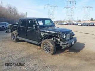 ✅ 2021 Jeep Gladiator Overland • VIN: 1C6HJTFG1ML606215 • Lot: 41771646. Listed on IAAI with 77,411 mi. Free auction sales archive from the USA and detailed vehicle history report at DreamBid. Image 1.