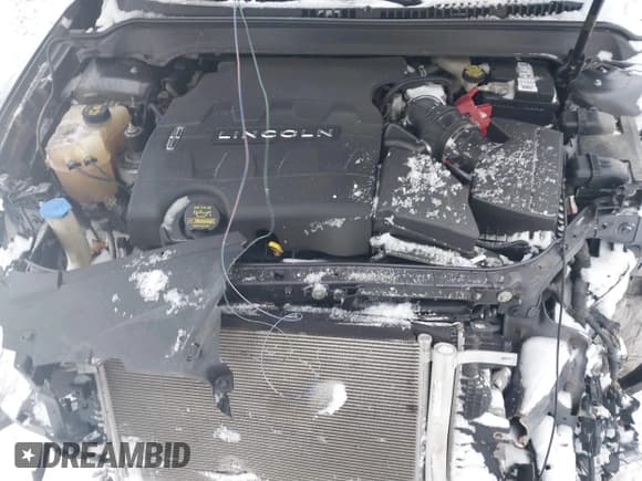 ✅ 2013 Lincoln MKZ • VIN: 3LN6L2GK0DR825820 • Lot: 41603721. Wystawiony na IAAI z przebiegiem 110 837 mil. Bezpłatny archiwum sprzedaży aukcyjnych z USA i szczegółowy raport historii pojazdu na DreamBid. Zdjęcie 10.