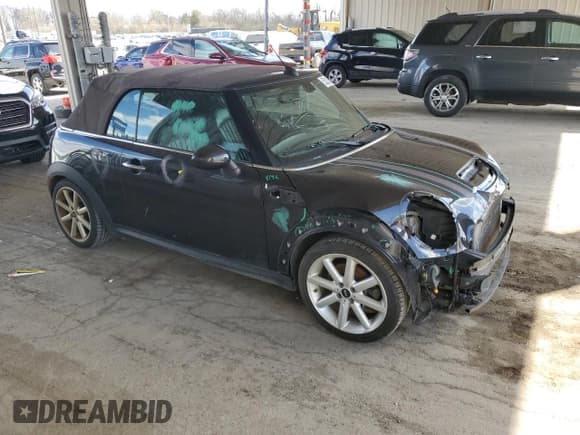 ✅ 2014 MINI Convertible S • VIN: WMWZP3C55ET706573 • Lot: 52325705. Listed on Copart with 125,076 mi. Free auction sales archive from the USA and detailed vehicle history report at DreamBid. Image 4.