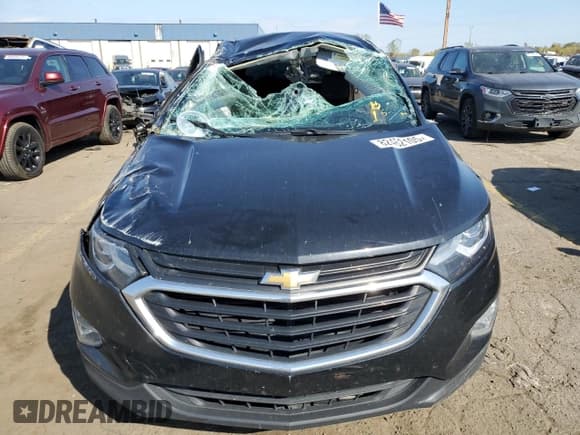 ✅ 2021 Chevrolet Equinox LT • VIN: 3GNAXKEV6ML345596 • Lot: 82462105. Wystawiony na Copart z przebiegiem 56 054 mil. Bezpłatny archiwum sprzedaży aukcyjnych z USA i szczegółowy raport historii pojazdu na DreamBid. Zdjęcie 5.