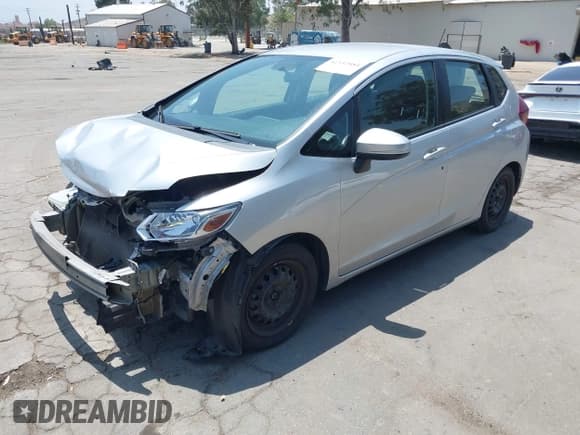 ✅ 2015 Honda Fit LX • VIN: 3HGGK5H58FM784019 • Lot: 42332884. Listed on IAAI with 123,675 mi. Free auction sales archive from the USA and detailed vehicle history report at DreamBid. Image 2.