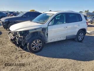 ✅ 2013 Volkswagen Tiguan S • VIN: WVGAV7AX6DW529056 • Lot: 95997665. Listed on Copart with 111,749 mi. Free auction sales archive from the USA and detailed vehicle history report at DreamBid. Image 1.